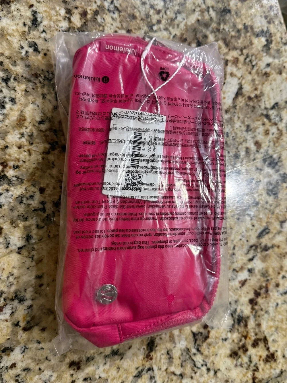 Cranberry (hot pink) brand new, in bag, unopened, lululemon belt bag